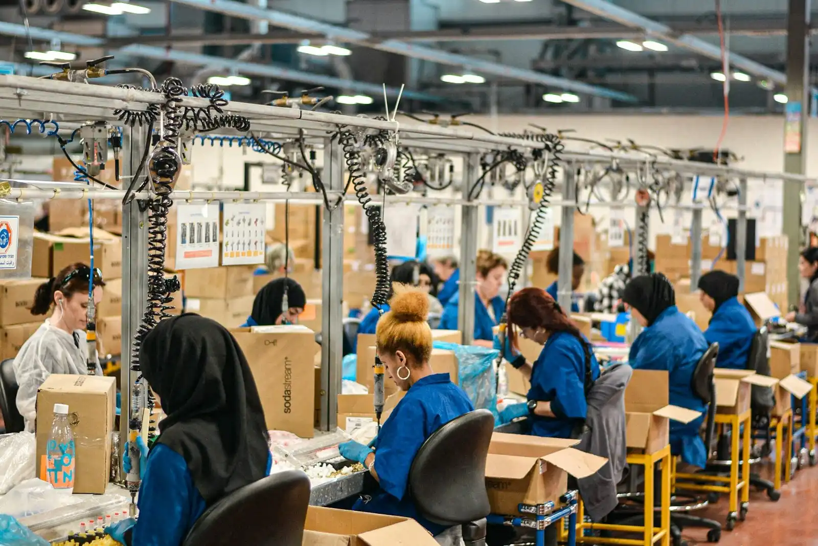Manufacturing production line workers on an assembly line
